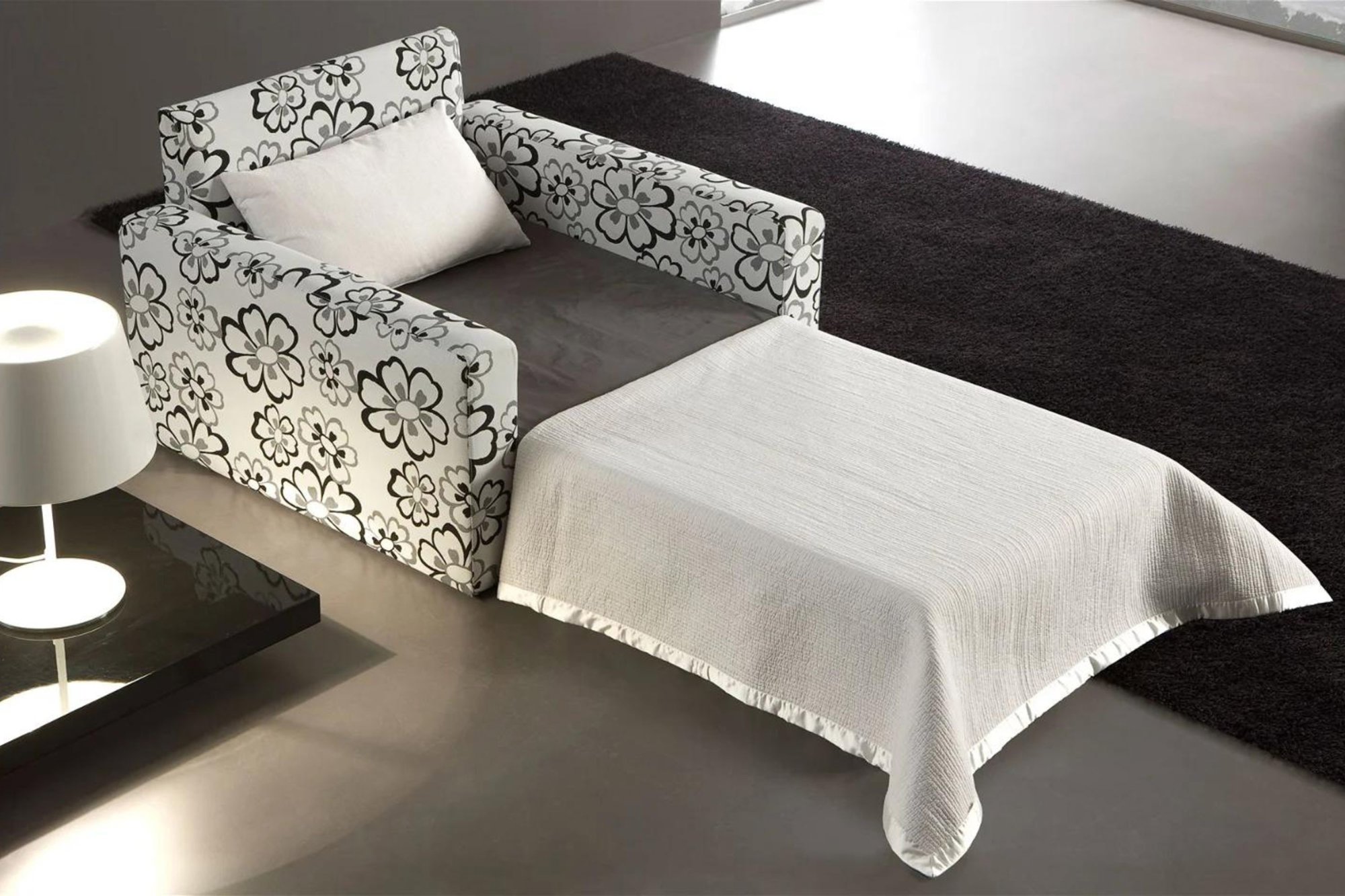Sofá cama individual y floral 