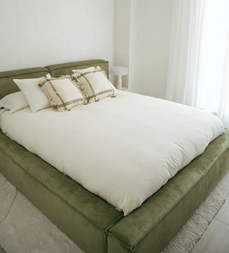 dormitorio acogedor en tonos verdes