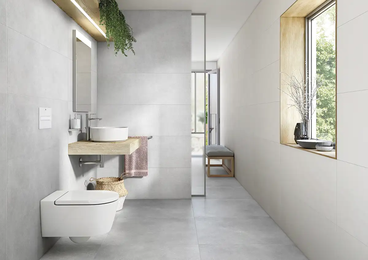 Baño moderno con lavabo e inodoro de la colección 'Inspira', de Roca