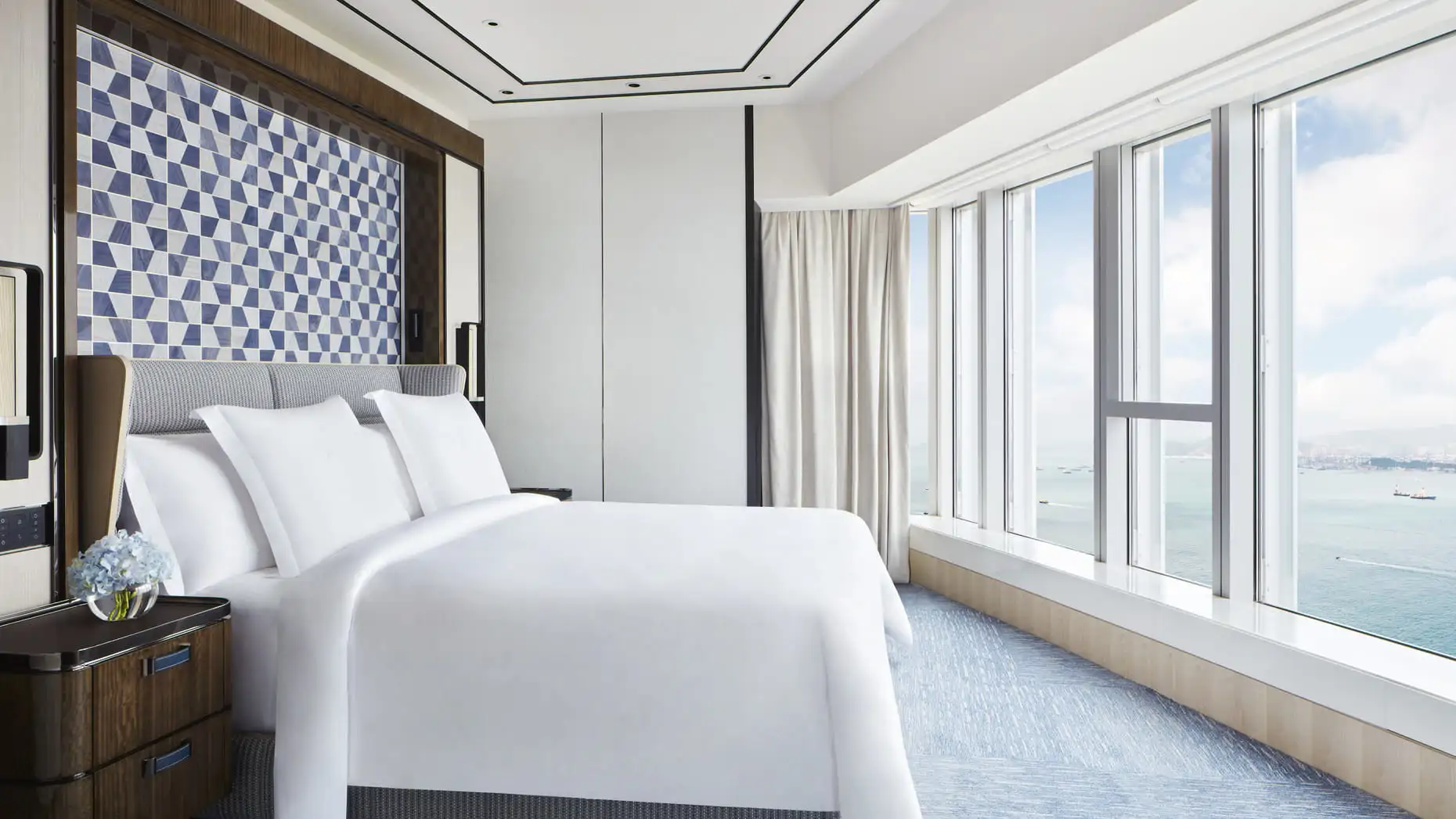 Dormitorios muy acogedores en el Four Seasons Hong Kong.